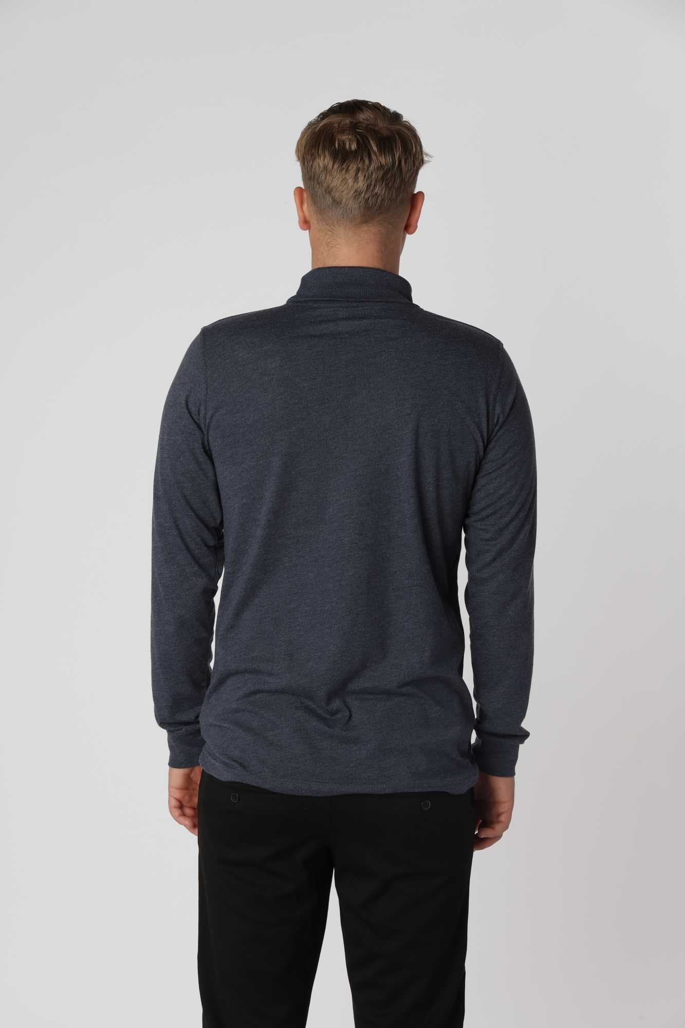 Elegant Meleret Blå Turtleneck T-shirt med diskret melering for et moderne og underspillet look.